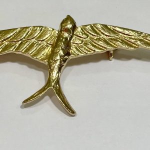 Broche golondrina