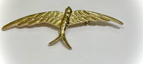 Broche golondrina