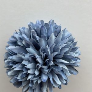 Pompón azul empolvado