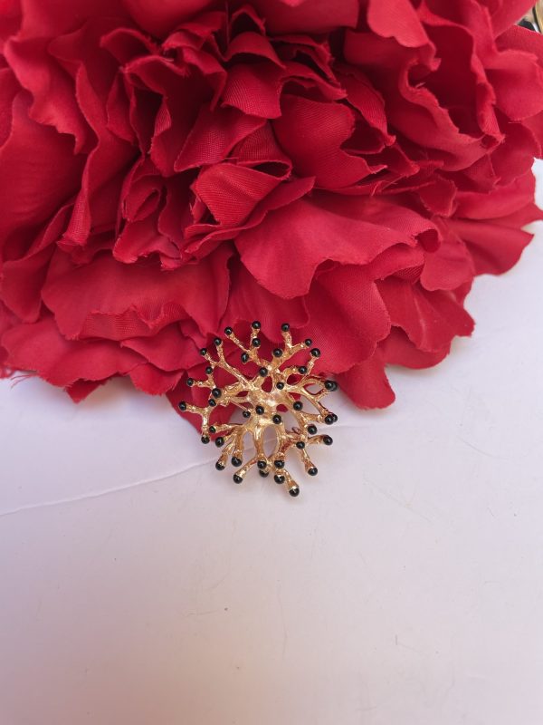 Broche pompón