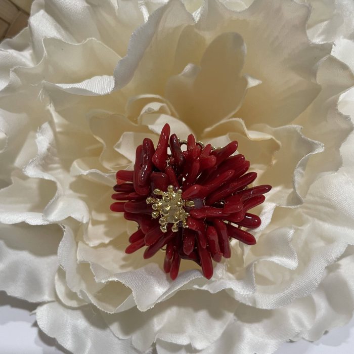 Broche Blanca rojo